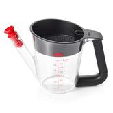 OXO Good Grips fat separator pouring with 2-cup capacity