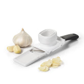 OXO Good Grips garlic slicer blade close-up for precise, even slices.