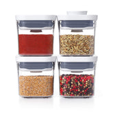 OXO Good Grips Mini POP containers on a shelf maximize compact kitchen storage.