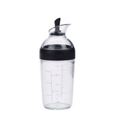 OXO Good Grips Mini Shaker cap open for easy ingredient addition.