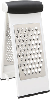 OXO Good Grips Multi Grater upright on a cutting board for stable grating