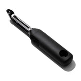 OXO Good Grips Serrated Peeler blade close-up, showing sharp serration for effortless peeling.