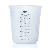 OXO Good Grips 2-Cup Squeeze & Pour cup demonstrating precise pour spout for easy measuring