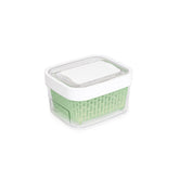 OXO Good Grips storage container in white, ideal for keeping berries fresh.