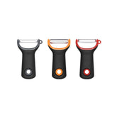 OXO Good Grips straight peeler showing sharp rustproof blade for precise peeling.