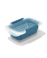 OXO Good Grips Prep & Go colander inside container for rinsing produce.