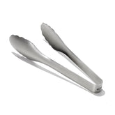 OXO Steel Serving Tongs close-up of scalloped head for added grip in tossing