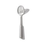 OXO Steel Slotted Spoon top view drains liquids while lifting vegetables.