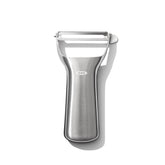 OXO Steel Y-Peeler blade gliding through firm produce for quick prep
