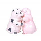 Pacific Giftware Hugging Pigs salt and pepper shakers on table, decorative and functional.