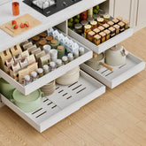PAKETA pull-out drawer 21-deep in cabinet for easy access to contents.