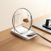 PAVSTINE pot lid holder on the counter keeps lids organized and within reach.