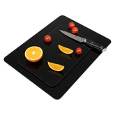 Phore tempered glass cutting board with non-slip feet for stable food prep.