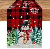 Pinata Christmas table runner close-up shows red buffalo plaid fabric for festive tables.