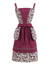 Pinknoke floral pattern kitchen apron enhances feminine style while cooking and baking.