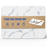 Plentio Quick Dry Stone Mat dries dishes quickly on a clean kitchen counter