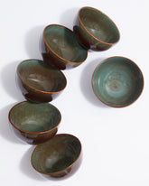 Pokini stoneware bowls stacked in brown and green for space-saving storage