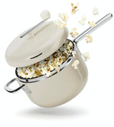 POPSMITH cream popcorn popper on stove for quick, delicious popcorn.