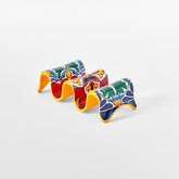 Prepara yellow taco holder keeps 2-3 tacos upright for mess-free filling.
