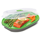 PrepSolutions steamer for fish and veggies gray basket enables quick microwave steaming for healthy meals.