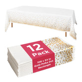 Prestee white and gold polka dot tablecloth on wedding setup