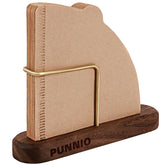PUNNIO coffee filter holder with brass rack on a dark wood base, organized.