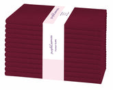 PurpleEssences 12-pack cotton napkins laid out for a table setting, showcasing premium textile quality