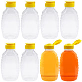 Qinsihwn eight-pack clear honey bottles viewed together for easy storage and pour control.