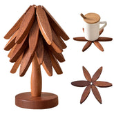 QIYLQE foldable black walnut trivet set protects countertops from hot dishes.