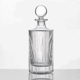 Queenstone Lead Free whiskey decanter with ribbed round glass for elegant serving.