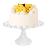 Quegroot 12-inch porcelain round cake stand viewed from top for stable serving display