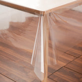 Rawgoodz clear tablecloth protector 70x70 protecting a dining surface