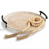 Relaxing Garden decorative round tray with bead garland enhances coffee table styling
