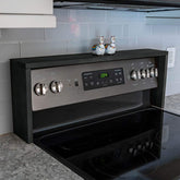 RELODECOR over-the-stove spice rack with ebony finish keeps spices within reach during cooking