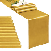 REWOMC gold satin table runner on a 12x108 inch table for upscale event ambiance.