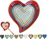 Rhobtyne heart-shaped ceramic spoon rest on stove top keeping spoons tidy