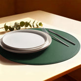 Rinpon round green placemats on table showing protective, wipeable surface