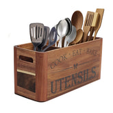 RMCOKGX utensil holder in acacia wood on counter offering ample utensil storage.