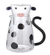 RockTrend cartoon cow clear glass carafe for bedside hydration.