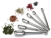 RSVP Endurance spice spoons nested on the storage chain for easy access