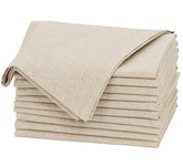 Ruvanti napkins folded on a rustic table add elegant dining texture