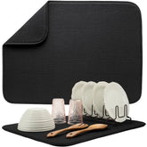 S&T INC Dish Drying Mat XL on counter absorbs water quickly, protecting countertops.