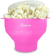 Salbree pink collapsible popcorn popper showing compact storage and color.