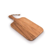 Samhita acacia wood cutting board with grip handles ready for prep and serving.