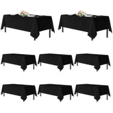 Sancua black 8ft rectangle tablecloth on a table for elegant dining.