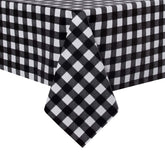 Sancua checkered tablecloth in black and white on a dining table, stylish surface protection.