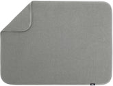 S&T INC. dish drying mat XL 18x24 on counter absorbs water and keeps surfaces dry.