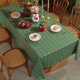 SASTYBALE Christmas tablecloth in green buffalo plaid for festive family dinners.
