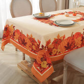 SASTYBALE pumpkin tablecloth on beige background protects your table from spills.