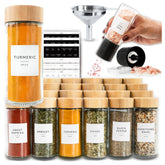 Savvy & Sorted glass spice jars with bamboo lids arranged in a drawer for easy access.